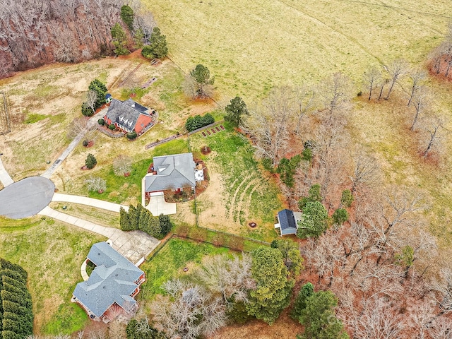 birds eye view of property featuring a rural view