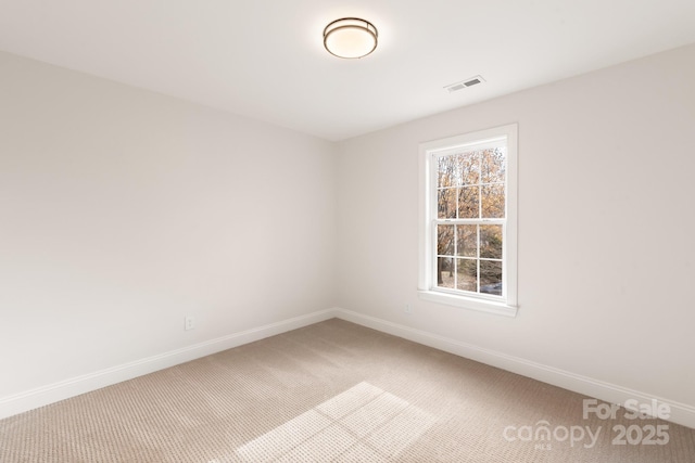 view of carpeted spare room