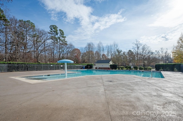 view of pool featuring a patio area