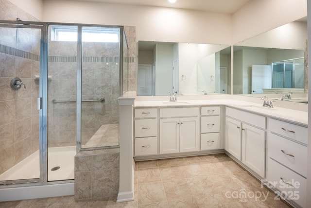 bathroom featuring vanity and walk in shower