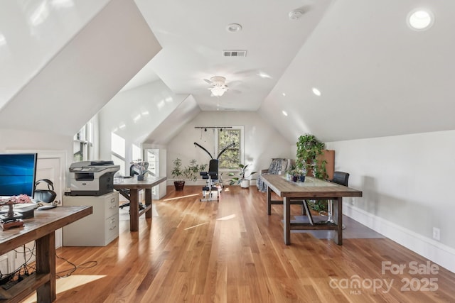 office with light hardwood / wood-style flooring, vaulted ceiling, and ceiling fan