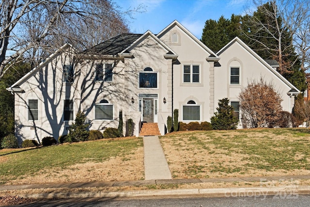 view of front of home featuring a front lawn