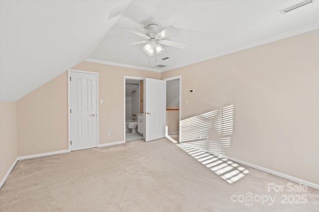 bonus room featuring ceiling fan, lofted ceiling, and light colored carpet