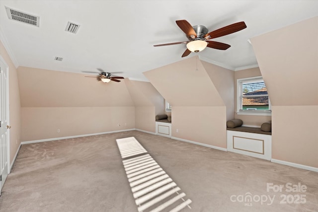 bonus room with ceiling fan, light colored carpet, and lofted ceiling