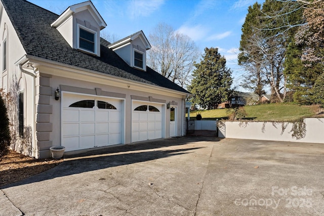 view of property exterior featuring a garage