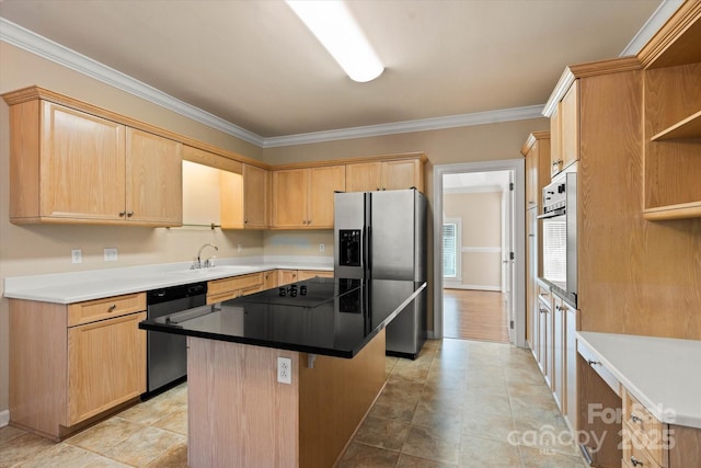 kitchen featuring light brown cabinetry, crown molding, a center island, and stainless steel appliances