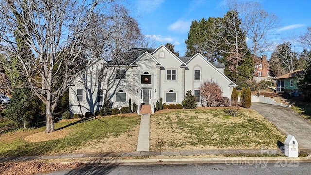 front of property featuring a front yard