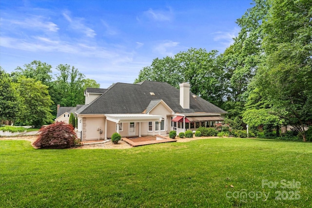 430 43rd Ave NW, Hickory, NC 28601 - rear view of house featuring a lawn, a chimney, stucco siding, and a shingled roof
