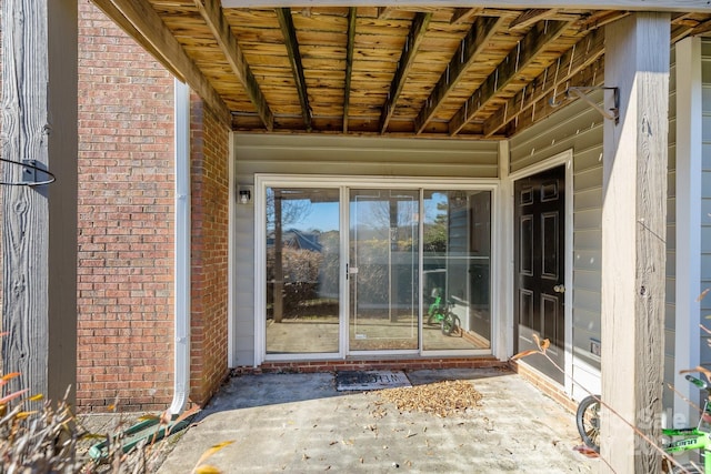 doorway to property with a patio