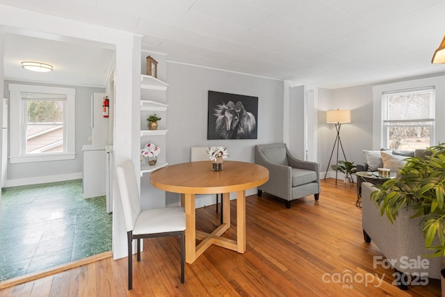 dining area featuring hardwood / wood-style floors