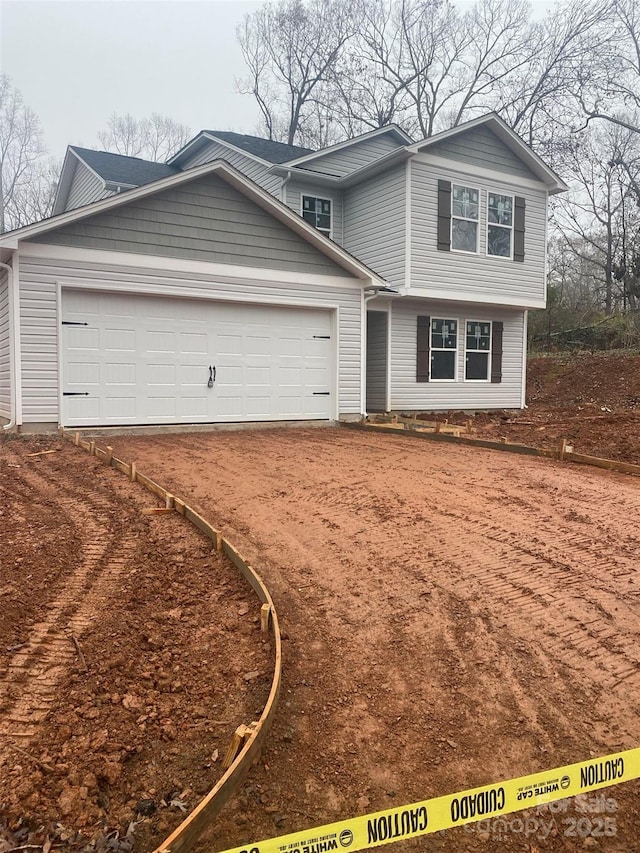 view of front of house with a garage