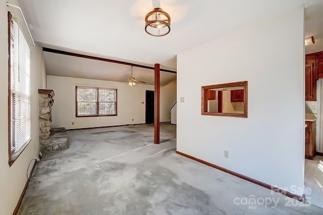 interior space featuring ceiling fan and light colored carpet