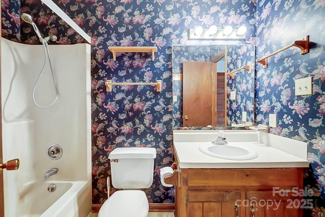 full bathroom featuring tub / shower combination, toilet, and vanity