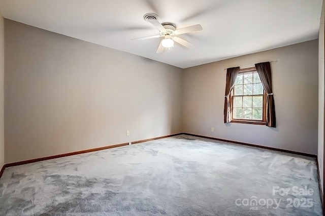 unfurnished room with carpet floors and ceiling fan