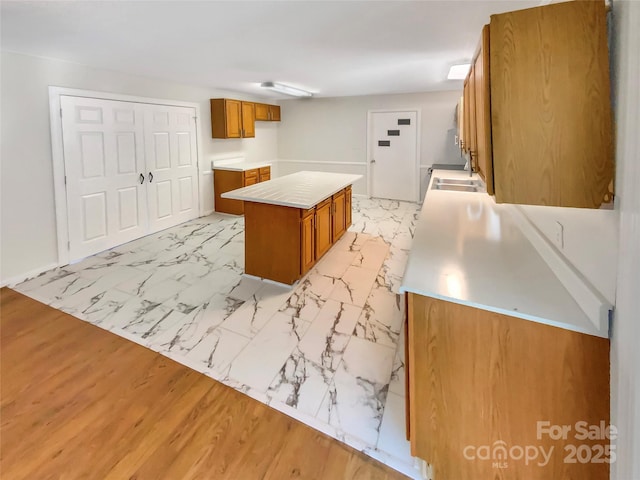 kitchen with sink and a kitchen island