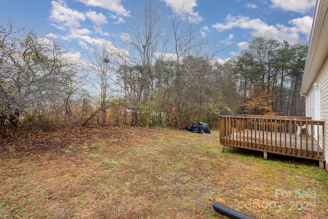 view of yard featuring a deck