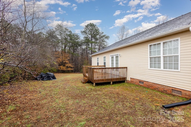 view of yard featuring a deck