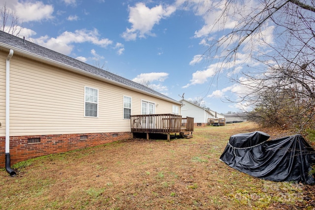 view of yard with a deck