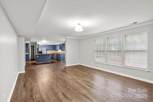 unfurnished living room with crown molding and dark hardwood / wood-style floors