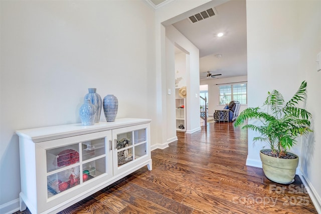 hallway featuring dark hardwood / wood-style flooring