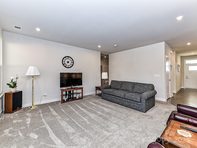 living room featuring carpet floors