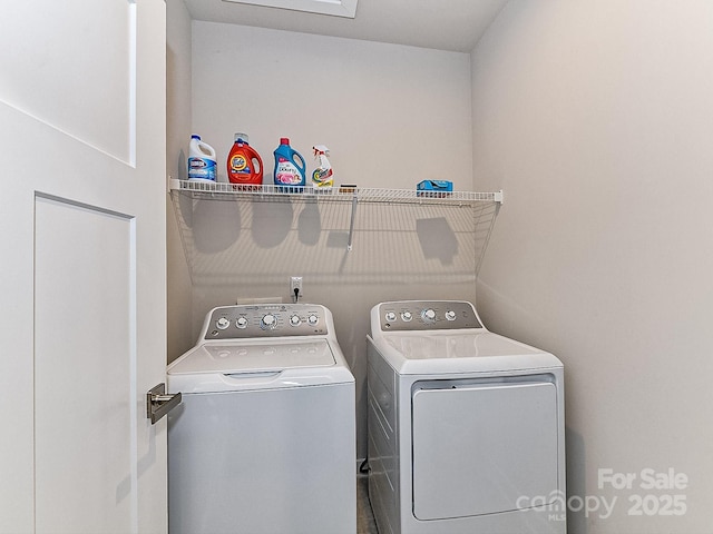 laundry room with washer and clothes dryer