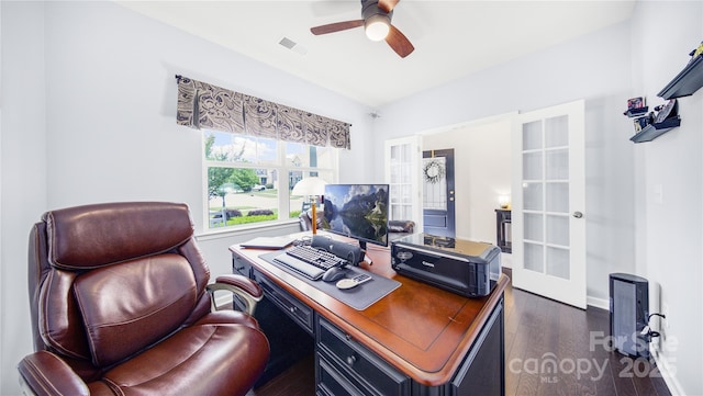 home office featuring dark hardwood / wood-style flooring, ceiling fan, and french doors