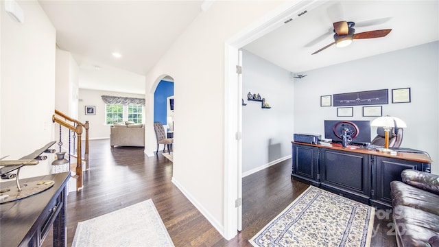 office space featuring ceiling fan and dark hardwood / wood-style floors