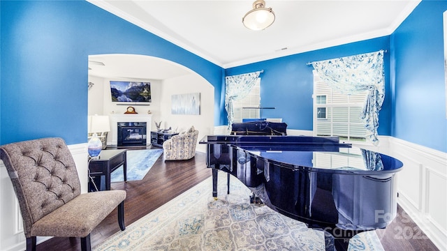 office area featuring hardwood / wood-style flooring and ornamental molding