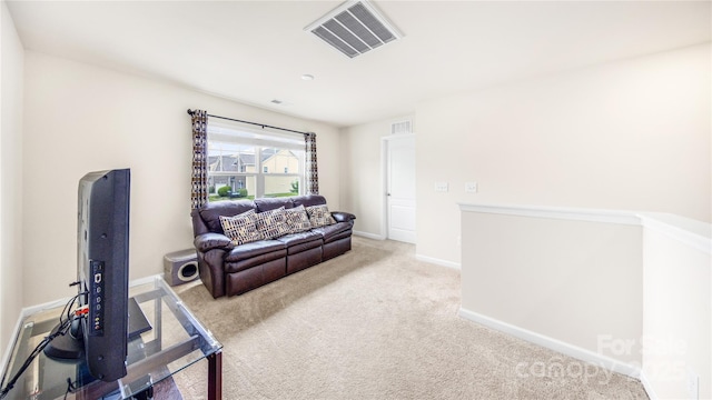 living room with light colored carpet