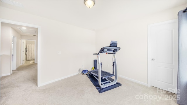 exercise room with light carpet