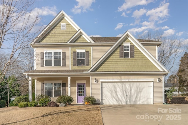 craftsman inspired home featuring a garage