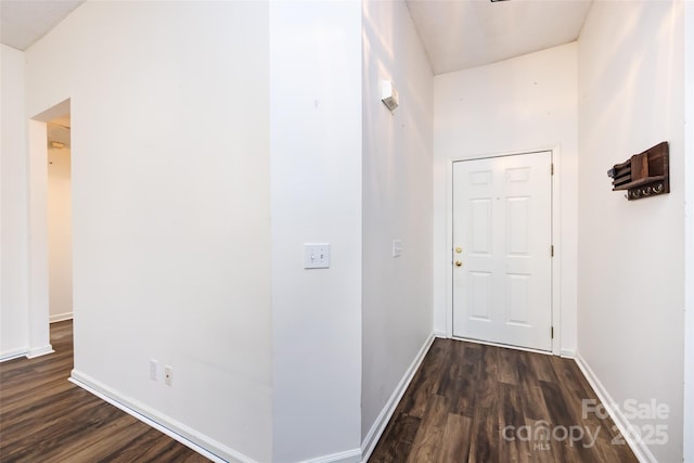 hallway featuring dark hardwood / wood-style floors