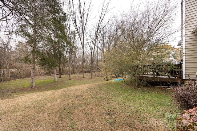 view of yard featuring a deck