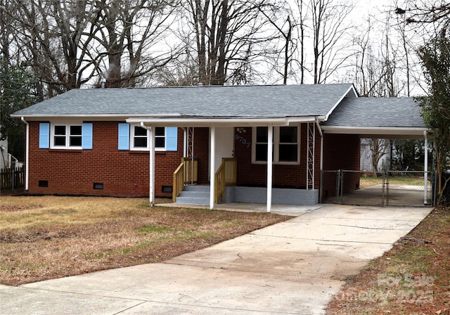 view of front facade with a carport and a front lawn