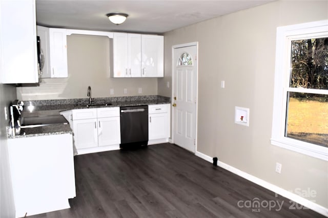 kitchen with stainless steel dishwasher, stove, white cabinetry, and sink