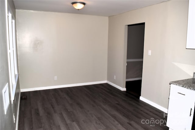 interior space featuring dark wood-type flooring