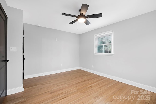 unfurnished room featuring hardwood / wood-style flooring and ceiling fan