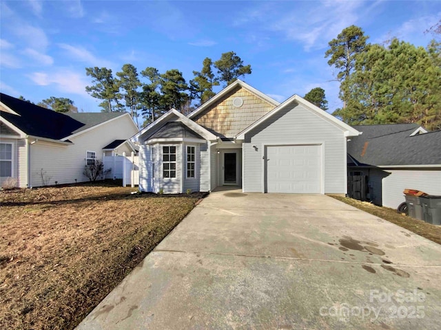 single story home featuring a garage