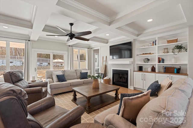 living room with ceiling fan, beam ceiling, coffered ceiling, and light hardwood / wood-style flooring