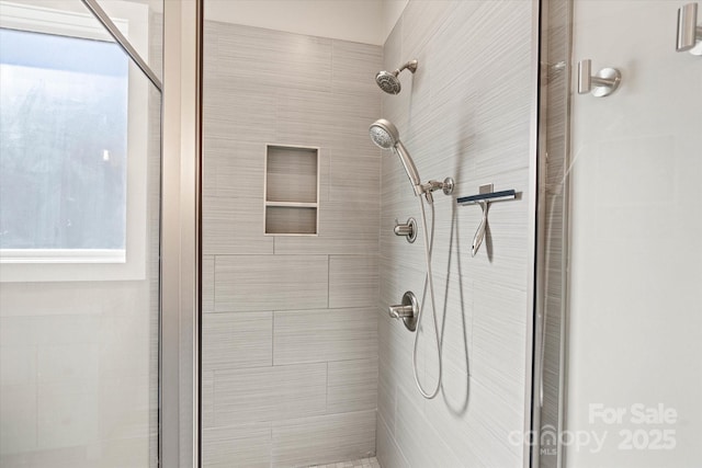 bathroom with an enclosed shower