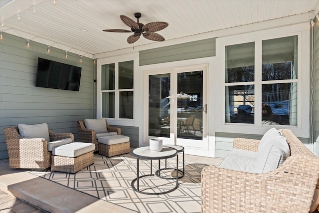 view of patio featuring an outdoor hangout area and ceiling fan