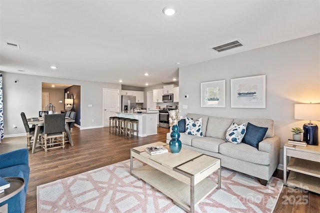 living room with hardwood / wood-style floors