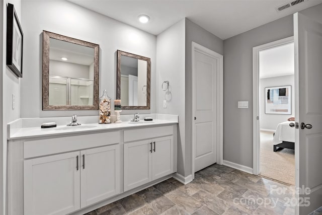 bathroom with vanity and walk in shower