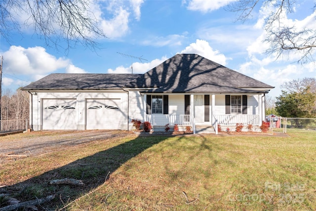 single story home featuring a front lawn, a porch, and a garage