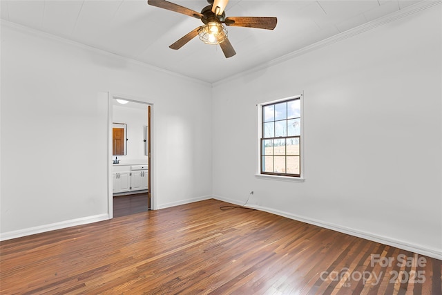 unfurnished room featuring dark hardwood / wood-style floors, ceiling fan, and ornamental molding