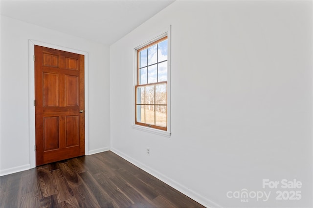 foyer featuring dark hardwood / wood-style floors