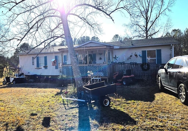 ranch-style house with a front yard