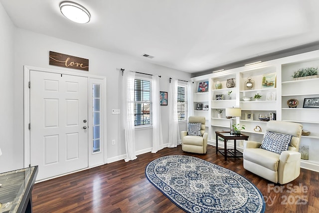 entrance foyer with dark hardwood / wood-style floors