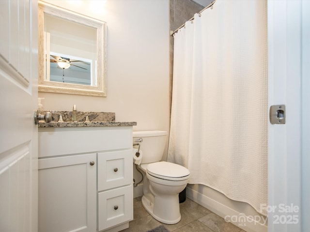 full bathroom featuring tile patterned floors, vanity, toilet, and shower / bathtub combination with curtain